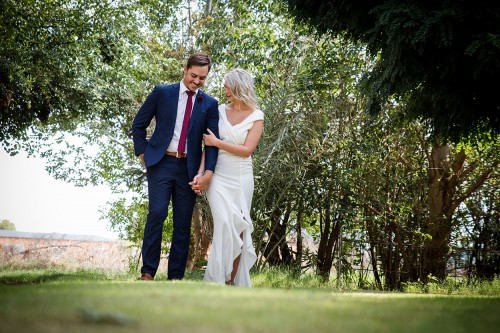 bridal couple walking together by Unix photography Wedding photography of bridal couple walking together by Unix photography
